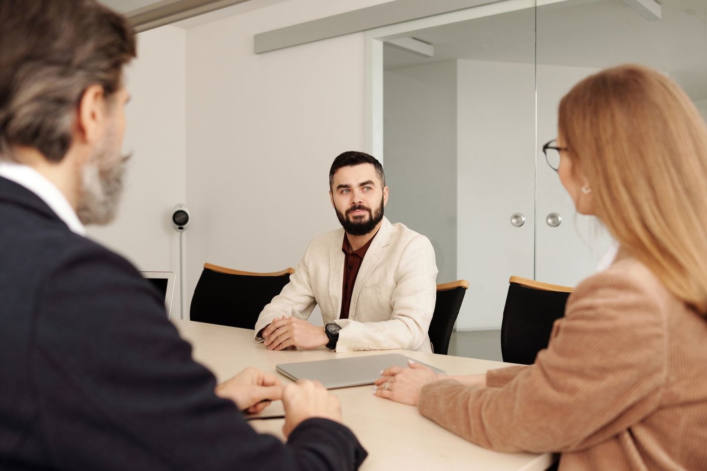One-to-one conversation with notes on the table