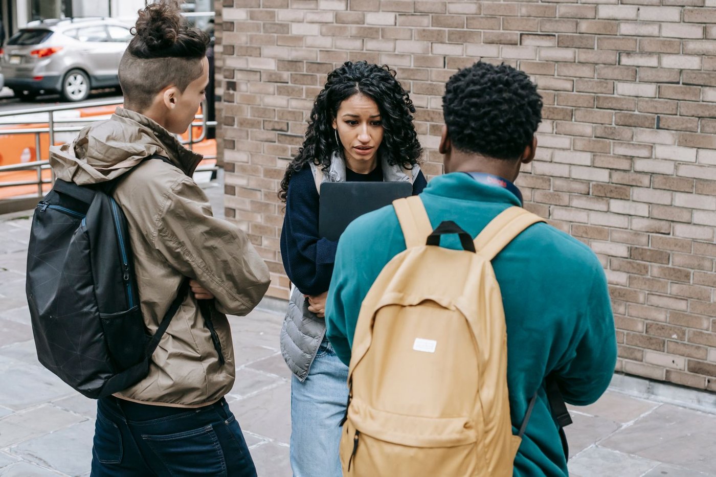 Learners on a staircase in a college building